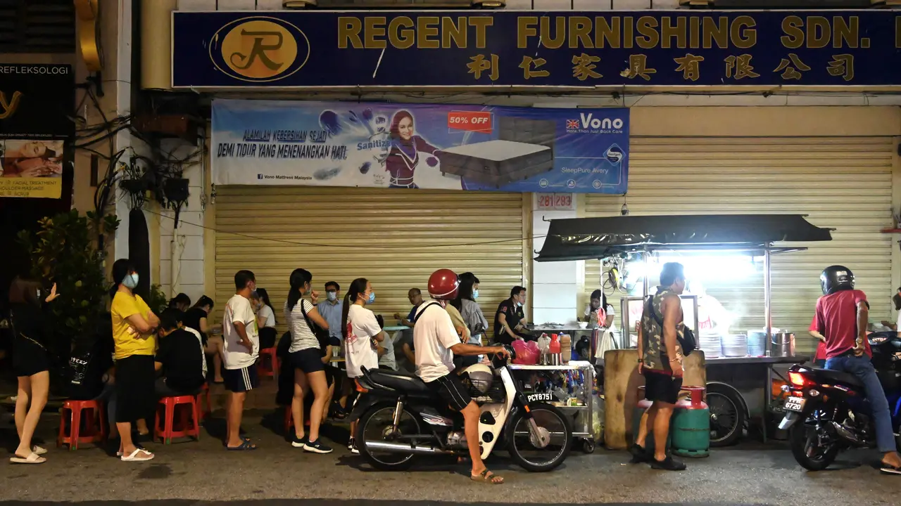Aktivitas Warga Penang Malaysia di Tengah Peringatan Gelombang Kedua Covid-19