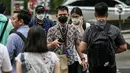 Kementerian Kesehatan mengimbau masyarakat kembali disiplin menggunakan masker, terutama saat berada di ruang ruang terbuka. (Liputan6.com/Faizal Fanani)