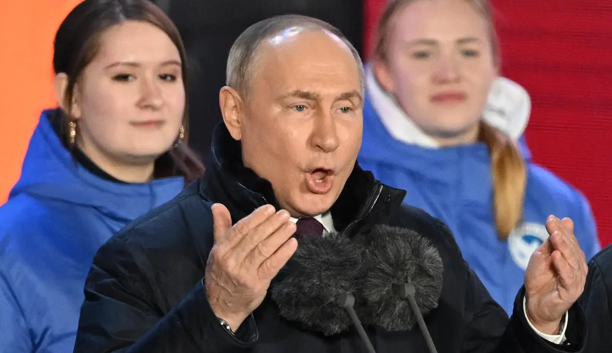 Kehadiran Putin untuk ikut dalam peringatan 10 tahun aneksasi Krimea oleh Rusia. (NATALIA KOLESNIKOVA/AFP)