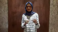 Atlet taekwondo Indonesia, Dhean Titania Fazrin, berpose saat berada di Hotel Mulia, Jakarta, Jumat (8/6/2018). Dirinya merupakan atlet taekwondo yang dipersiapkan untuk Asian Games 2018. (Bola.com/Vitalis Yogi Trisna)