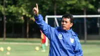 Jafri Sastra tak mau melontarkan ucapan pedas jelang pertemuannya dengan Nilmaizar di laga krusial babak 8 besar Piala Jenderal Sudirman. (Bola.com/Robby Firly)