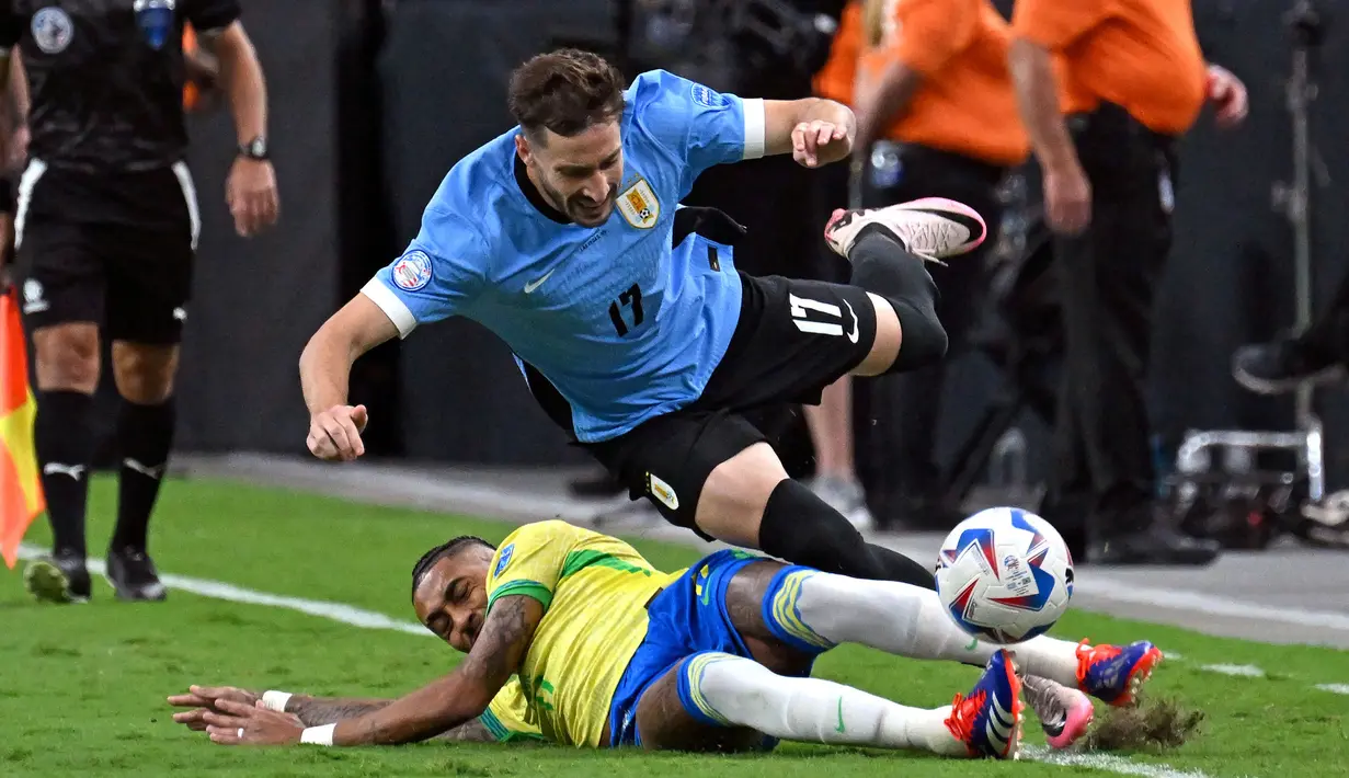 Pemenang laga pun harus ditentukan lewat adu penalti. (Robyn Beck/AFP)