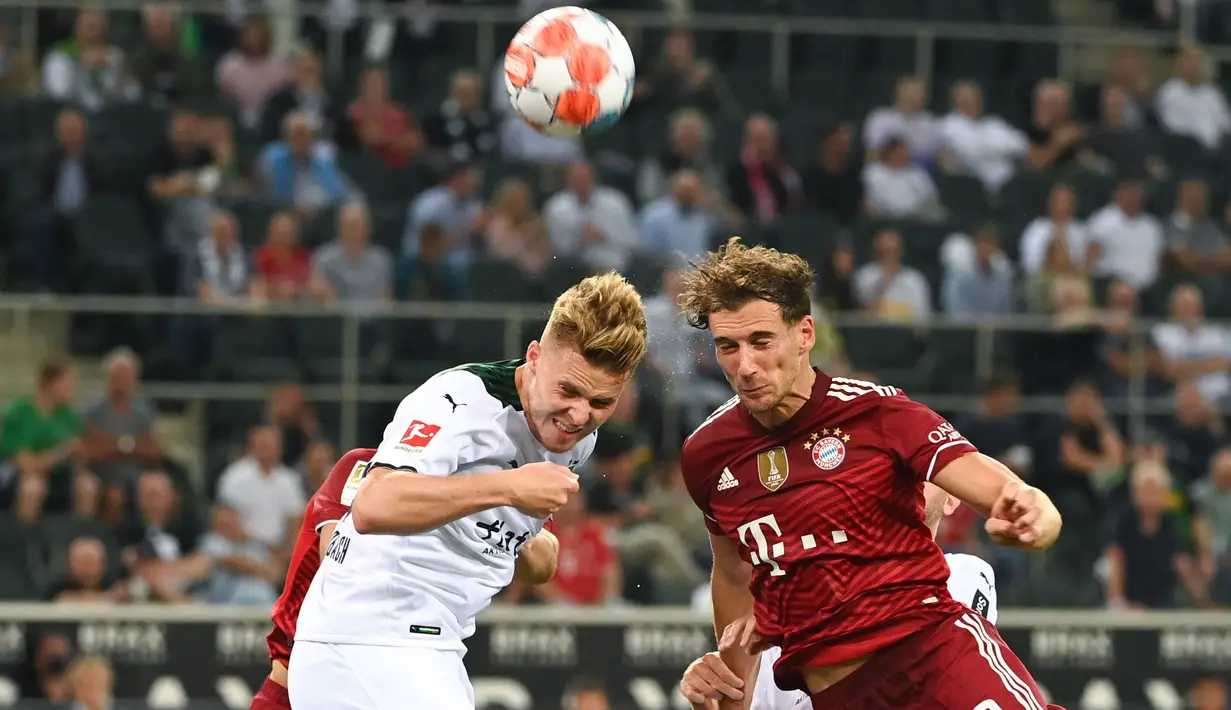 Bayern Muncih gagal berikan kemenangan di laga pembuka Liga Jerman usai ditahan imbang oleh Moenchengladbach. Tuan rumah mampu merepotkan juara bertahan Liga Jerman musim 2020/2021. (Foto: AFP/Ina Fassbender)