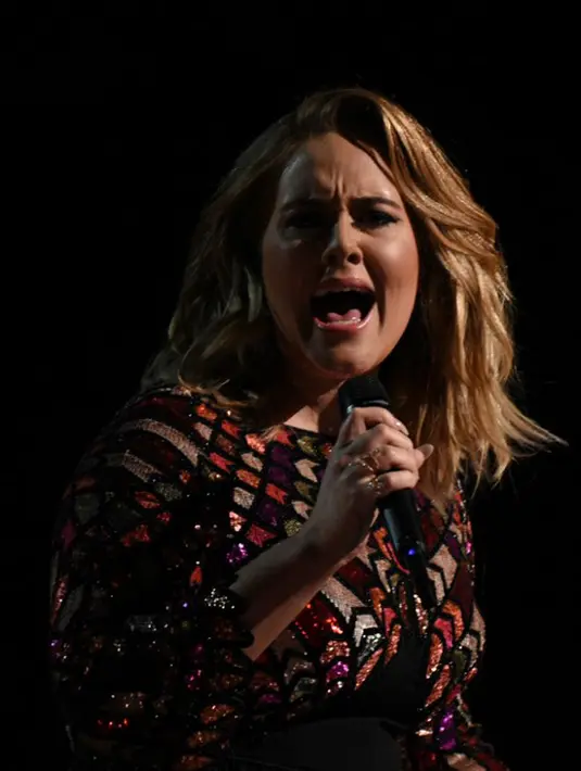 Adele memang dikabarkan sedang istirahat untuk sementara waktu. Namun ia akan kembali menghibur para penggemarnya dengan menggelar sebuah konser, meskipun bukan dalam waktu dekat ini. (AFP/Bintang.com)