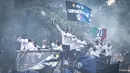 Inter Milan merayakan gelar Serie A ke-20, Minggu (28/4/2024). Para pemain diarak menggunakan bus terbuka di Kota San Siro, Italia. (Marco Ottico/LaPresse via AP)
