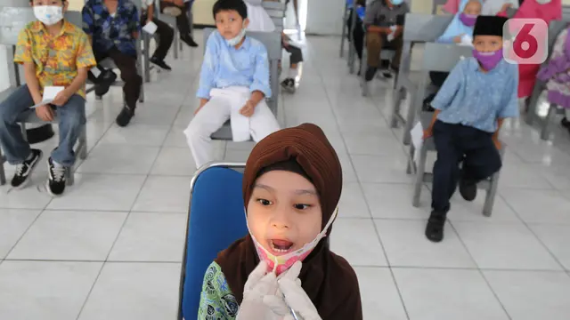 Ekspresi Anak-Anak Saat Kegiatan Bulan Imunisasi Anak Sekolah