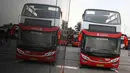 Bus transjakarta yang akan digunakan untuk pawai kemenangan tim Persija Jakarta di kantor PT Transjakarta, Cawang, Kamis (13/12). Bus tersebut akan digunakan untuk pawai kemenangan berkeliling Jakarta Sabtu (15/12).( Liputan6.com/Immanuel Antonius)