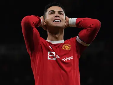 Raihan gol MU hingga pekan ke-24 musim ini hanya berada di posisi ke-5 anggota Big Six. Cristiano Ronaldo, sebagai top skor sementara klub baru mencetak 8 gol di Liga Inggris. Akankah musim ini akan menjadi raihan gol terkecil dibanding 5 musim terakhir berikut. (AFP/Paul Ellis)