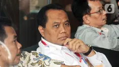 Direktur Operasional dan Pelayanan Publik Perum Bulog, Tri Wahyudi Saleh menunggu panggilan penyidik akan menjalani pemeriksaan sebagai saksi terkait kasus suap pengelolahan Distribusi gula di PTPN III di Gedung KPK, Jakarta, Selasa (17/12/2019). (merdeka.com/Dwi Narwoko)