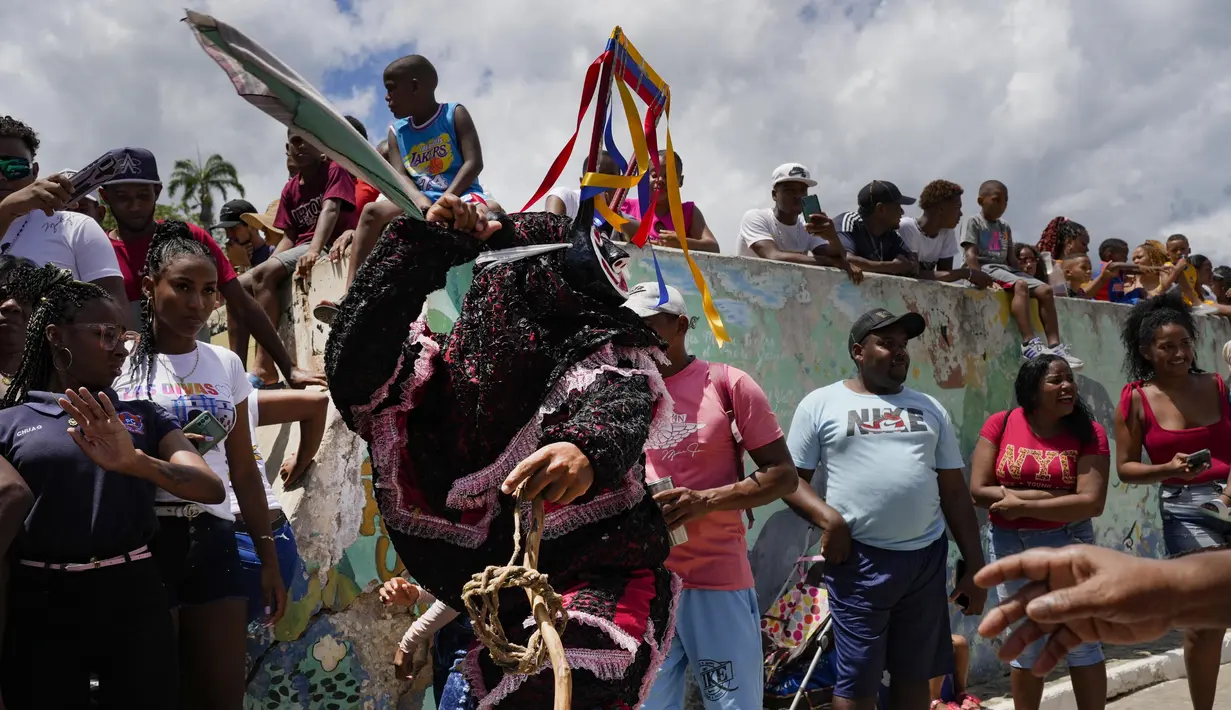 Perayaan 'Corpus Christi' ini merupakan sebuah festival yang sebagian besar diikuti masyarakat beragama Katolik. (AP Photo/Matias Delacroix)