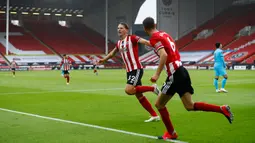 Gelandang Sheffield United, Sander Berge berselebrasi dusai mencetak gol ke gawang Tottenham Hotspur pada pertandingan lanjutan Liga Inggris di Bramall Lane di Sheffield, Inggris (2/7/2020). Sheffield United menang telak 3-1 atas Tottenham. (Oli Scarff/Pool via AP)