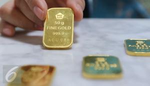 Di awal pekan ini, harga emas PT Aneka Tambang Tbk (ANTAM) bertahan di posisi Rp 599 ribu per gram, Jakarta, Senin(10/10). Jumlah itu tidak mengalami perubahan dari harga perdagangan akhir pekan kemarin. (Liputan6.com/Angga Yuniar)