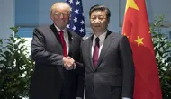 Presiden Donald Trump dan Presiden Xi Jinping di G20 (AP)