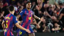 Pemain Barcelona, Marcus Rashford, merayakan gol pembuka dalam pertandingan Liga Spanyol melawan Real Madrid di Camp Nou, Spanyol, Senin (11/5/2026) dini hari WIB. (AP Photo/Joan Mateu Parra)