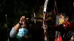 Seorang anak laki-laki berpartisipasi dalam latihan memanah yang diadakan SAN Archery Club di Desa Ciater, Tangerang Selatan (9/8/2020). SAN Archery Club dibuka kembali bagi anggotanya untuk berlatih kembali dengan mengikuti protokol kesehatan di tengah wabah COVID-19. (Agung Kuncahya B./Xinhua)