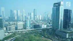 Lansekap gedung bertingkat terlihat di kawasan Jakarta, Selasa (13/8/2019). Pembangunan gedung di DKI Jakarta mengalami penurunan dari yang biasanya 15 unit per tahun saat ini hanya lima unit gedung. (Liputan6.com/Immanuel Antonius)