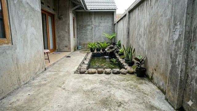 Desain Kolam Ikan Mini Nempel Tembok Rumah di Teras Sempit