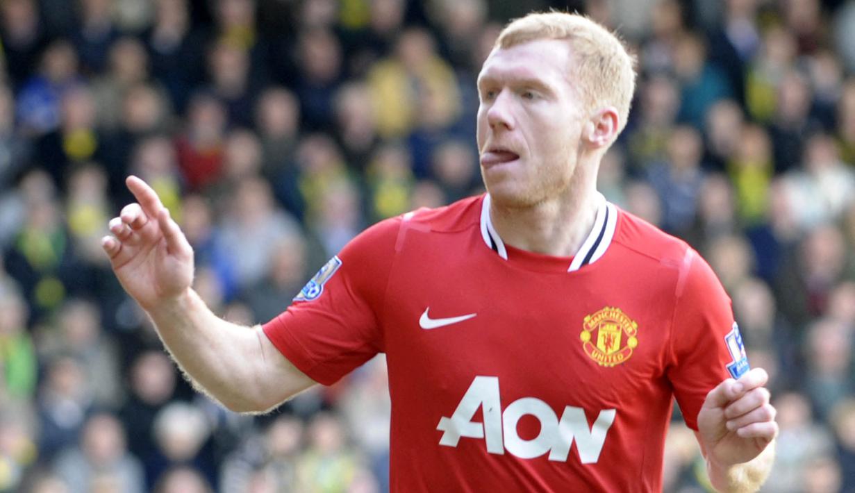 Paul Scholes merupakan pemain yang tergabung dalam Class of 92'. Usai memutuskan pensiun pada musim 2010/11, ia akhirnya dipanggil kembali ke Old Trafford pada Januari 2012. Hasilnya, Scholes berhasil mempersembahkan gelar Liga Inggris di musim itu. (AFP/Olly Greenwood)