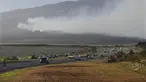 Asap berhembus melintasi lereng gunung berapi Haleakala di Maui, Hawaii, saat api membakar wilayah pedalaman Maui pada Selasa, 8 Agustus 2023. (Matthew Thayer/The Maui News via AP)