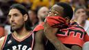 Pemain Toronto Raptors, Terrence Ross dan Luis Scola, menyaksikan timnya berlaga melawan Cleveland Cavaliers pada Final Wilayah Timur, NBA Playoffs 2016 di Quicken Loans Arena, Rabu (18/5/2016) WIB. Cavs menang 115-84.(Ken Blaze-USA TODAY Sports/Reuters)