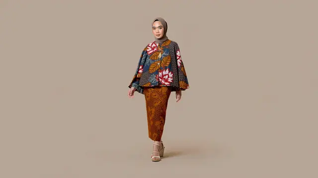 Model Baju Batik Terbaru yang Cocok untuk Wanita Berhijab/Ilustrasi oleh AI