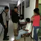 Tersangka pasangan mesum yang ditangkap dalam Penggerebekan hotel. (Foto: Liputan6.com/Polres Kebumen/Muhamad Ridlo)