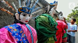 Menurutnya, keberadaan ondel-ondel sebagai salah satu kebudayaan Betawi wajib dirawat dengan baik dan harus tetap lestari. (Liputan6.com/Angga Yuniar)