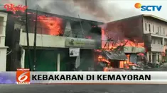 Tiupan angin yang kencang menyebabkan kebakaran cepat membesar.