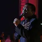 Penyanyi Didi Prasetyo atau yang lebih dikenal Didi Kempot saat tampil pada konser bertajuk "The Lord of Loro Ati" di kawasan SCBD, Jakarta, Jumat (6/12/2019). Mengawali karier sejak 1989, Didi Kempot memilih musik campursari sebagai pilihan dalam berkesenian. (Liputan6.com/Herman Zakharia)