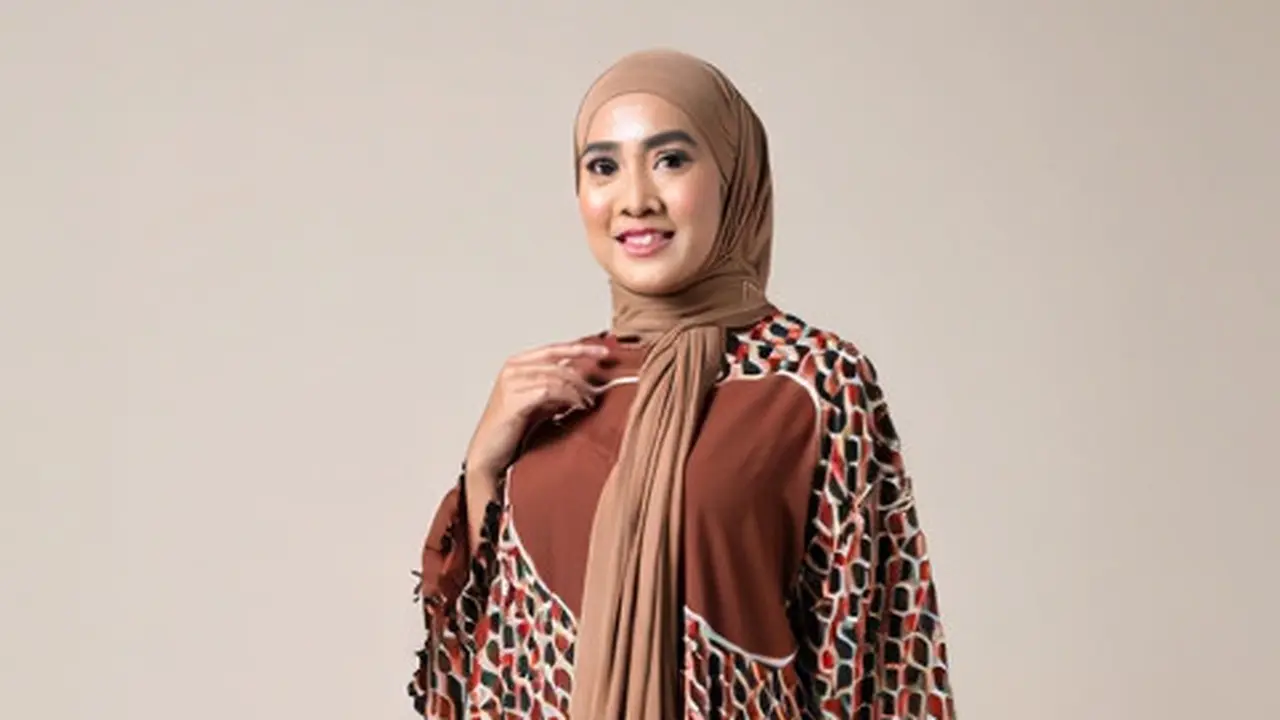 Model Baju Batik Terbaru yang Cocok untuk Wanita Berhijab/Ilustrasi oleh AI
