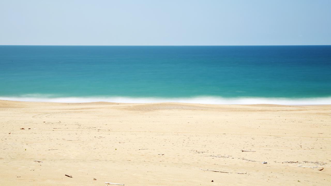 Ilustrasi pasir laut (Foto: Unsplash/Lopez Robin)