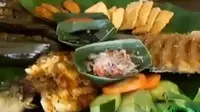 Wisatawan yang berkunjung ke Bali bisa mencoba wisata kuliner Magibung.