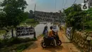 Longsornya sampah di TPA Cipayung berdampak pada terisolirnya jalan dan beberapa rumah warga di Kampung Bulak Barat RT 04 RW 08 Kelurahan Cipayung, Depok. (merdeka.com/Arie Basuki)