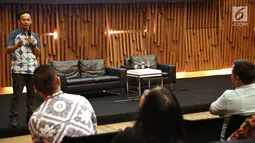 Kepala Subdit Penyidikan dan Penindakan Teguh Arifiyadi saat hadir menjadi narasumber dalam seminar di SCTV Tower, Jakarta, Senin (13/11). Seminar tersebut bertemakan 'Penegakan Hukum ITE dan Penanganan Konten'. (Liputan6.com/Faizal Fanani)