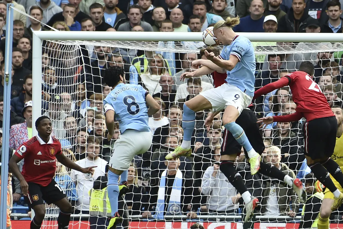 Foto: Aksi Memukau Erling Haaland dan Phil Foden Saat Man City Bantai MU di Liga Inggris, Keduanya Cetak Rekor Baru