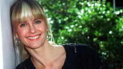 Olivia Newton-John pada 1990. (AP Photo/Julie Parkes, File)