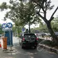 Pengendara mobil dan motor saat ingin masuk ke kawasan IRTI Monas, Jakarta, Selasa (26/5/2015). UPT Parkir Dinas Perhubungan dan Transportasi DKI Jakarta akan meningkatkan Pendapatan Asli Daerah (PAD) dari retribusi parkir. (Liputan6.com/Faizal Fanani)