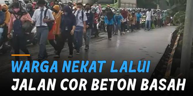 VIDEO: Tak Sabar Hadapi Macet, Warga Nekat Lalui Jalan Cor Beton Basah
