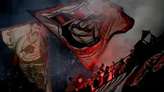 Penggemar AC Milan menyalakan suar dan mengibarkan bendera selama pertandingan melawan Sassuolo pada lanjutan Liga Serie A Italia di stadion San Siro, Milan, Italia (2/3). AC Milan menang 1-0 atas Sassuolo. (AP Photo/Luca Bruno)