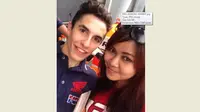 Sasha Pratista, wanita asal Indonesia yang bekerja di Malaysia, berhasil mencium pebalap Repsol Honda, Marc Marquez.