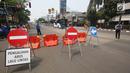 Papan pengalihan arus lalu lintas saat kegiatan Car free day (CFD) di Jalan Warung Jati Barat, Jakarta Selatan, Minggu (17/9). Car free day kembali digelar untuk kedua kalinya di kawasan Mampang Prapatan hingga Pejaten. (Liputan6.com/Immanuel Antonius)