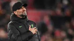 Jurgen Klopp saat merayakan kemenangan timnya di akhir pertandingan sepak bola perempat final Piala Liga Inggris antara Liverpool dan West Ham United di Anfield di Liverpool, barat laut Inggris pada 20 Desember 2023. (Oli SCARFF/AFP)