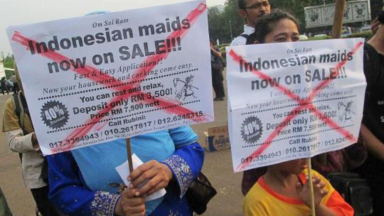 Aksi Migrant Care demo iklan obral TKI di Istana