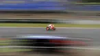 Pebalap MotoGP dari Repsol Honda Team, Marc Marquez melaju pada lintasan saat Balapan MotoGP Republik Ceska di Sirkuit Brno, (6/8/2017). (AP/Petr David Josek)