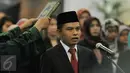 Sekjen MPR yang baru Ma'ruf Cahyono saat bersumpah saat pelantikan dirinya, Senayan, Jakarta, Rabu (3/2/2016). Ma'ruf Cahyono mengantikan Edi Siregar yang memasuki masa pensiun sejak Desember 2015. (Liputan6.com/Johan Tallo)