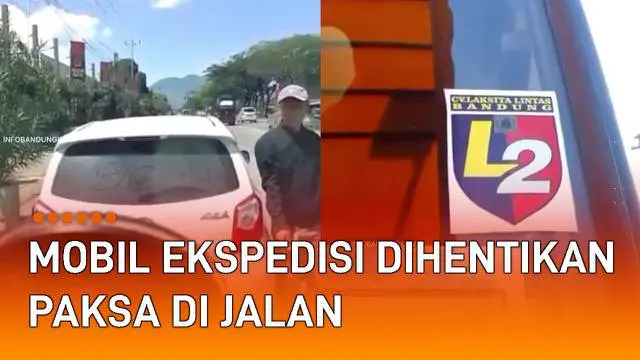 Seorang sopir mobil ekspedisi dihentikan paksa di jalan oleh oknum pengemudi lain.