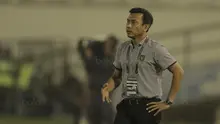 Pelatih Bali United, Widodo C. Putro, saat pertandingan melawan Madura United pada laga Piala Presiden di Stadion Manahan, Solo, Sabtu, (3/2/2018). Bali United menang adu penalti 5-4 atas Madura United. (Bola.com/M Iqbal Ichsan)