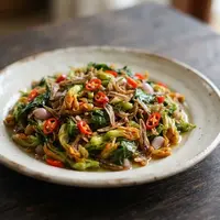 Resep Tumis Bunga Pepaya dengan Teri dan Cabai Rawit. (AI Generated)