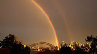 Ada 2 pelangi terlihat di langit Sydney, Australia. (News.com.au)