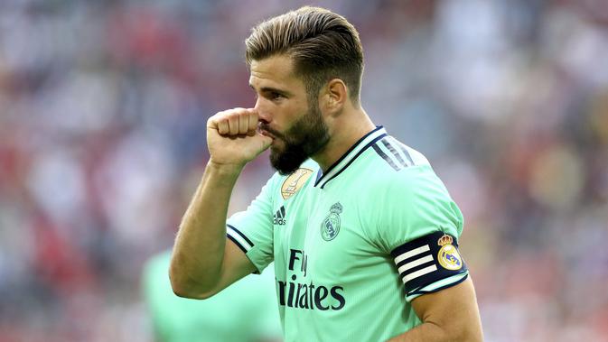 Bek Real Madrid, Nacho berselebrasi usai mencetak gol ke gawang Fenerbahce pada pertandingan Audi Cup 2019 di stadion Allianz Arena di Munich, Jerman (31/7/2019). Madrid menempati posisi ketiga di Audi Cup 2019. (AP Photo/Matthias Schrader)